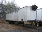 1985 Peerless tri-axle chip trailer (No Tires & Rims)