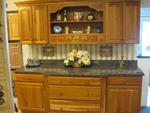 SHOWPLACE HUTCH IN NATURAL CHERRY, GRANITE COUNTERTOP Auction Photo