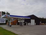 Repair Facility Restaurant (4) - Rental Cabins (2) Bldg. Lots - Rolling Stock & Shop Equip. Auction Photo