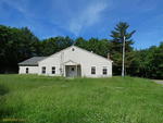 3,568+/- SF Mixed-Use Building - 2.61+/- Acres Auction Photo