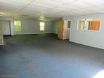 3,568+/- SF Mixed-Use Building - 2.61+/- Acres Auction Photo