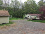 Double-wide Home ~ 2-Car Garage Auction Photo
