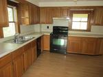 3BR Cape Style Home - .61+/- Acres Auction Photo