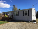 2007 Doublewide Mobile Home - .87+/- Acres Auction Photo