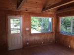  1BR Cottage – 5.2+/- Acres - Beech Hill Pond Access  Auction Photo