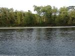 Gravel Pit ~ 57+/- Acres ~ River Frontage ~ Island Auction Photo